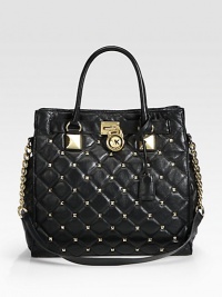 A structured design in luxurious, quilted leather accented with chic, signature hardware and shiny pyramid studs.Double top handles, 4¾ dropChain and leather shoulder strap, 12½ dropMagnetic snap closureProtective metal feetOne inside zip pocketFour inside open pocketsOne key hookCotton lining14¼W X 13H X 5½DImported A structured design in luxurious, quilted leather accented with chic, signature hardware and shiny pyramid studs.Double top handles, 4¾ dropChain and leather shoulder strap, 12½ dropMagnetic snap closureProtective metal feetOne inside zip pocketFour inside open pocketsOne key hookCotton lining14¼W X 13H X 5½DImported