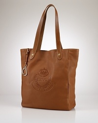 Crafted for chic versatility in sumptuous pebbled leather, the Putnum tote is finished with equestrian-inspired accents and an elegantly embossed crown crest for an iconic heritage look. From Lauren Ralph Lauren. Crafted for chic versatility in sumptuous pebbled leather, the Putnum tote is finished with equestrian-inspired accents and an elegantly embossed crown crest for an iconic heritage look. From Lauren Ralph Lauren.