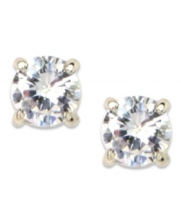 Glittery and glamorous, these stud earrings from Anne Klein are an absolute dream with bezel-set glass stones. Set in silver tone mixed metal. Approximate diameter: 1/4 inch. Glittery and glamorous, these stud earrings from Anne Klein are an absolute dream with bezel-set glass stones. Set in silver tone mixed metal. Approximate diameter: 1/4 inch.