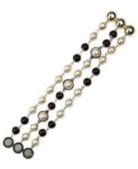 Everyday elegance from Anne Klein. Three rows of glass pearls and jet plastic beads captivate on this lovely bracelet. Finished with a magnetic closure. Crafted in gold tone mixed metal. Approximate length: 8-1/2 inches. Everyday elegance from Anne Klein. Three rows of glass pearls and jet plastic beads captivate on this lovely bracelet. Finished with a magnetic closure. Crafted in gold tone mixed metal. Approximate length: 8-1/2 inches.