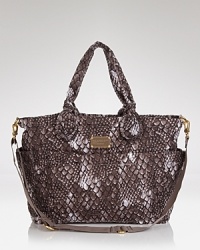 A favorite of stylish moms, this nylon MARC BY MARC JACOBS baby bag features an effortless on-duty design, with pockets to keep the essentials organized and at the ready. A favorite of stylish moms, this nylon MARC BY MARC JACOBS baby bag features an effortless on-duty design, with pockets to keep the essentials organized and at the ready.