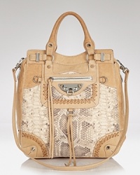 Take your day-to-day look in an exotic direction with this python-embossed leather tote from Sam Edelman. Ideal for the essentials and wholly versatile, it's a punchier take on practical style. Take your day-to-day look in an exotic direction with this python-embossed leather tote from Sam Edelman. Ideal for the essentials and wholly versatile, it's a punchier take on practical style.