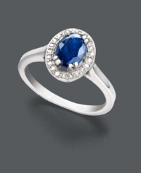 Petite elegance. This sophisticated beauty features a faceted oval-cut sapphire (1 ct. t.w.) with a sparkling halo of round-cut diamond accents. Ring crafted in sterling silver. Size 7. Petite elegance. This sophisticated beauty features a faceted oval-cut sapphire (1 ct. t.w.) with a sparkling halo of round-cut diamond accents. Ring crafted in sterling silver. Size 7.
