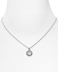 Invidualize your ensemble with Judith Jack's round crystal pendant. This elegant amulet is an easy addition to your jewelry collection. Invidualize your ensemble with Judith Jack's round crystal pendant. This elegant amulet is an easy addition to your jewelry collection.