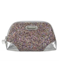 Get your glam on with this shimmery sequin cosmetic case from Nine West. Petite and poised to stash all your beauty must-haves, it easily slips into almost any handbag for on the go touch-ups anytime. Get your glam on with this shimmery sequin cosmetic case from Nine West. Petite and poised to stash all your beauty must-haves, it easily slips into almost any handbag for on the go touch-ups anytime.