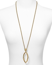 With a shapely hammered pendant, T Tahari's gold-tone necklace is sure to define your neckline. Highlight the statement design with classic pieces to ensure the focus remains on this glamorous adornment. With a shapely hammered pendant, T Tahari's gold-tone necklace is sure to define your neckline. Highlight the statement design with classic pieces to ensure the focus remains on this glamorous adornment.