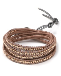 Nod to natural style with this leather wrap bracelet from Chan Luu, accented by striking rose gold stones. It's an effortless way to finish an eclectic look. Nod to natural style with this leather wrap bracelet from Chan Luu, accented by striking rose gold stones. It's an effortless way to finish an eclectic look.