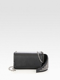 A chain strap and polished spikes take your look to the next level with this design of pebbled leather. Chain and leather studded shoulder strap, 22 dropFlap top with magnetic snap closureOne inside open pocketSignature red lining7W X 4H X 2DMade in Italy A chain strap and polished spikes take your look to the next level with this design of pebbled leather. Chain and leather studded shoulder strap, 22 dropFlap top with magnetic snap closureOne inside open pocketSignature red lining7W X 4H X 2DMade in Italy