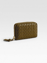 Richly woven leather keeps you stylishly organized. Zip-around closure Two dividers create three sections for cards, coins or currency Leather lining 4L X 3H X 1D Made in Italy Richly woven leather keeps you stylishly organized. Zip-around closure Two dividers create three sections for cards, coins or currency Leather lining 4L X 3H X 1D Made in Italy