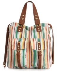 Pack up for a long day with the roomy Informer shopper from Olivia + Joy. A fun-loving striped design featuring gold-tone hardware and buckle detailing. Pack up for a long day with the roomy Informer shopper from Olivia + Joy. A fun-loving striped design featuring gold-tone hardware and buckle detailing.