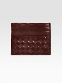 Easy access to all of your cards in this distinctive woven leather design. Six credit card slotsCenter zip compartmentOne open slot4W X 3¼H X 1DMade in Italy Easy access to all of your cards in this distinctive woven leather design. Six credit card slotsCenter zip compartmentOne open slot4W X 3¼H X 1DMade in Italy