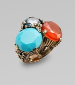 From the Trujillo Collection. Colors both bright and soft complement each other delightfully in this three-stone cluster ring with a richly detailed bronze setting and band.Blue topaz, turquoise and orange chalcedonyBronzeMade in USA