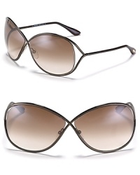 Add a modern element to your beach ensemble with Tom Ford's crossover metal sunglasses. Add a modern element to your beach ensemble with Tom Ford's crossover metal sunglasses.