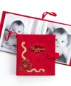 Personalize your tree and keep loved ones near with the photo album ornament from Holiday Lane. Featuring a dated cover and embroidered poinsettia motif in bold red.