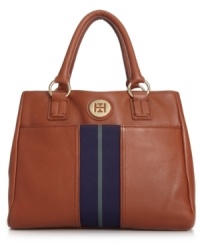Make a definitive daytime statement with this elegant design from Tommy Hilfiger. Sumptuous leather and signature hardware adorn the outside, while its surprisingly spacious interior effortlessly stows your everyday essentials. Make a definitive daytime statement with this elegant design from Tommy Hilfiger. Sumptuous leather and signature hardware adorn the outside, while its surprisingly spacious interior effortlessly stows your everyday essentials.