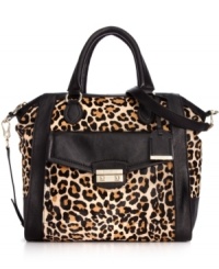 Cole Haan brings a touch of the exotic to everyday accessorizing with this leopard print-inspired design, featuring soft haircalf and signature detailing. Outfitted with plenty of pockets and compartments, it's the practical way to exude uptown allure. Cole Haan brings a touch of the exotic to everyday accessorizing with this leopard print-inspired design, featuring soft haircalf and signature detailing. Outfitted with plenty of pockets and compartments, it's the practical way to exude uptown allure.
