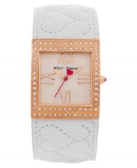 Wear your heart on your wrist with this adorable cuff watch from Betsey Johnson. Dressed in quilted leather with hints of rosy hues and crystal shimmer. Wear your heart on your wrist with this adorable cuff watch from Betsey Johnson. Dressed in quilted leather with hints of rosy hues and crystal shimmer.