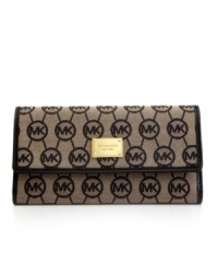 Whether you're jetting off to Rio or running errands around town, this luxe little lovely from MICHAEL Michael Kors is the perfect companion. The exterior is dressed to impress in signature jacquard and glam 18k gold hardware, while the interior is all about organization with separate checkbook holder, plenty of pockets and even a place for your favorite pen. Whether you're jetting off to Rio or running errands around town, this luxe little lovely from MICHAEL Michael Kors is the perfect companion. The exterior is dressed to impress in signature jacquard and glam 18k gold hardware, while the interior is all about organization with separate checkbook holder, plenty of pockets and even a place for your favorite pen.