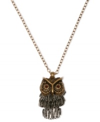 All eyes will be on you with Lucky Brand's shaky owl pendant. Crafted from silver and gold tone base metal with semi-precious carnelian accents, this necklace is quite the hoot. Approximate length: 18 inches + 2-inch extender. Approximate drop: 1-5/8 inches.