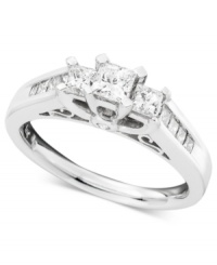 Fit for a princess! Three princess-cut stones are prong set in 14k white gold nestled within the sparkle of princess-cut, channel-set diamonds (1 ct. t.w.). Fit for a princess! Three princess-cut stones are prong set in 14k white gold nestled within the sparkle of princess-cut, channel-set diamonds (1 ct. t.w.).