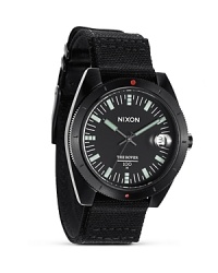 Solid with a surplus inspired design, this watch from Nixon flaunts a commanding look with performance-upping features like three-hand movement, durable canvas strap, and superfine markers. Solid with a surplus inspired design, this watch from Nixon flaunts a commanding look with performance-upping features like three-hand movement, durable canvas strap, and superfine markers.