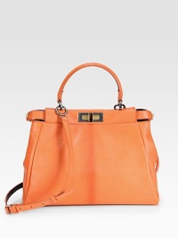 Sumptuous goatskin and calfskin with a structured silhouette, features a center stripe and signature logo lining.Top handle, 4½ drop Adjustable shoulder strap, 15-26 drop Turnlock closure Protective metal feet One inside zip pocket Fully lined 13W X 10H X 4D Made in Italy Sumptuous goatskin and calfskin with a structured silhouette, features a center stripe and signature logo lining.Top handle, 4½ drop Adjustable shoulder strap, 15-26 drop Turnlock closure Protective metal feet One inside zip pocket Fully lined 13W X 10H X 4D Made in Italy