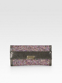 This multicolor glitter style is accented with a glossy textured leather trim.Magnetic snap flap closureOne inside zip pocketTwelve credit card slotsTwo bill compartmentsLeather lining9½W X 4¾H X 1DMade in Italy This multicolor glitter style is accented with a glossy textured leather trim.Magnetic snap flap closureOne inside zip pocketTwelve credit card slotsTwo bill compartmentsLeather lining9½W X 4¾H X 1DMade in Italy