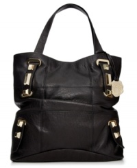 Get on-trend instantly with this bold, ultra-alluring design from Vince Camuto. Buttery-soft leather is highlighted with faceted golden studs, detail stitching and embossed signature charm, while the spacious interior lets you carry everything you need with endless convenience and style. Get on-trend instantly with this bold, ultra-alluring design from Vince Camuto. Buttery-soft leather is highlighted with faceted golden studs, detail stitching and embossed signature charm, while the spacious interior lets you carry everything you need with endless convenience and style.