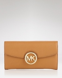 Compact style makes a statement with this leather wallet from MICHAEL Michael Kors. The gold logo detailing on this piece makes it a an enviable way to accessorize. Compact style makes a statement with this leather wallet from MICHAEL Michael Kors. The gold logo detailing on this piece makes it a an enviable way to accessorize.