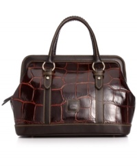 Express your allure for the exotic with this croc-inspired design from Dooney & Bourke. Gorgeous embossed leather is accented with custom hardware and buckle and stud accents. It's an elegant and on-trend way to carry your day-to-day essentials. Express your allure for the exotic with this croc-inspired design from Dooney & Bourke. Gorgeous embossed leather is accented with custom hardware and buckle and stud accents. It's an elegant and on-trend way to carry your day-to-day essentials.