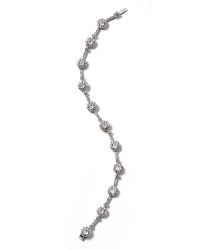 Glittering glamour is yours with Nadri's cubic zirconia and crystal framed bracelet. Perfect for holiday parties and events. Glittering glamour is yours with Nadri's cubic zirconia and crystal framed bracelet. Perfect for holiday parties and events.