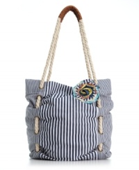 Sweet stripes and a fabulous floral embellishment give this American Rag bag the perfect warm weather look. Woven rope straps add a nautical touch to this oh-so adorable design. Sweet stripes and a fabulous floral embellishment give this American Rag bag the perfect warm weather look. Woven rope straps add a nautical touch to this oh-so adorable design.