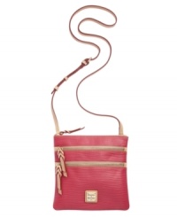 Throw on this travel-ready crossbody from Dooney & Bourke and show up in style, whatever your destination. A textured exterior is graced with gleaming gold-tone hardware, convenient exterior zip pockets and a classic signature plaque at front. Throw on this travel-ready crossbody from Dooney & Bourke and show up in style, whatever your destination. A textured exterior is graced with gleaming gold-tone hardware, convenient exterior zip pockets and a classic signature plaque at front.