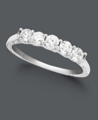 Add five drops of luminous sparkle to your special occasion. This dazzling wedding ring features round-cut diamonds (1/2 ct. t.w.) in a polished 18k white gold setting. IGI Certified diamonds. Add five drops of luminous sparkle to your special occasion. This dazzling wedding ring features round-cut diamonds (1/2 ct. t.w.) in a polished 18k white gold setting. IGI Certified diamonds.