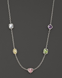 A rainbow of semi-precious, bezel-set gemstones dot this gleaming sterling silver chain. Each setting is unique. A rainbow of semi-precious, bezel-set gemstones dot this gleaming sterling silver chain. Each setting is unique.