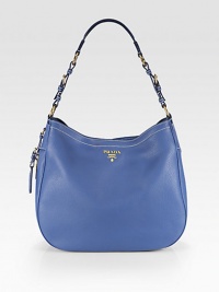 Pebbled leather carryall with an expandable zipper.Adjustable shoulder strap, 9½-10 dropMagnetic snap closureExpandable zipperOne inside zip pocketOne inside open pocketSignature jacquard liningZipped: 14W X 12H X 4½D; unzipped: 14W X 12H X 5¾DMade in Italy Pebbled leather carryall with an expandable zipper.Adjustable shoulder strap, 9½-10 dropMagnetic snap closureExpandable zipperOne inside zip pocketOne inside open pocketSignature jacquard liningZipped: 14W X 12H X 4½D; unzipped: 14W X 12H X 5¾DMade in Italy