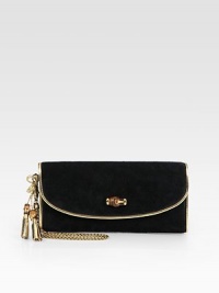 Suede defines this flap-front bag, trimmed with metallic leather and bamboo accents.Removable wristlet strap, 6¼ dropMagnetic flap and snap closureOne inside zip pocketOne inside snap pocketTwo credit card slotsOne mirrorFully lined9W X 4H X 1DMade in Italy Suede defines this flap-front bag, trimmed with metallic leather and bamboo accents.Removable wristlet strap, 6¼ dropMagnetic flap and snap closureOne inside zip pocketOne inside snap pocketTwo credit card slotsOne mirrorFully lined9W X 4H X 1DMade in Italy