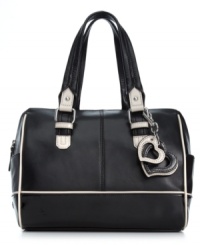 Ladies who lunch know that a chic satchel is an absolute accessories essential, like this posh piece form Calvin Klein. Crafted from rich leather with gleaming hardware and contrast trim, its generous interior stows everything with ease and elegance. Ladies who lunch know that a chic satchel is an absolute accessories essential, like this posh piece form Calvin Klein. Crafted from rich leather with gleaming hardware and contrast trim, its generous interior stows everything with ease and elegance.