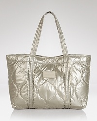 Destined to see heavy play in your accessories rotation, this See by Chloé tote is a lighter take on the classic day bag, crafted of nylon with quilt-effect detailing. Destined to see heavy play in your accessories rotation, this See by Chloé tote is a lighter take on the classic day bag, crafted of nylon with quilt-effect detailing.