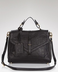 Equal parts slouchy and sophisticated, Tory Burch ups the cove-ability with this satchel. It's lived-in-look is coolly on trend, while a convertible design adds versatility. Equal parts slouchy and sophisticated, Tory Burch ups the cove-ability with this satchel. It's lived-in-look is coolly on trend, while a convertible design adds versatility.