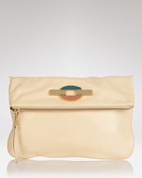 It-girls love Treesje's luxe leather littles, and this clutch epitomizes the brand's cool approach. It's foldover silhouette perfects low-key chic, so wear it to dress-down fancy wear or dress up favorite denim. It-girls love Treesje's luxe leather littles, and this clutch epitomizes the brand's cool approach. It's foldover silhouette perfects low-key chic, so wear it to dress-down fancy wear or dress up favorite denim.