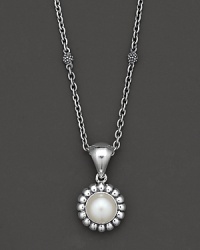 From the Luna Collection, a sterling silver fluted pendant with pearl accents on a chunky link chain. Designed by Lagos. From the Luna Collection, a sterling silver fluted pendant with pearl accents on a chunky link chain. Designed by Lagos.