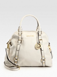 Supple leather design, finished with rivets, buckle detail and a signature goldtone logo tag.Double top handles, 4 dropAdjustable shoulder strap, 20-22 dropTop-zip closureOne outside open pocketProtective metal feetOne inside zip pocketOne inside key hookFour inside open pocketsCotton lining13W X 11H X 5¾DImported Supple leather design, finished with rivets, buckle detail and a signature goldtone logo tag.Double top handles, 4 dropAdjustable shoulder strap, 20-22 dropTop-zip closureOne outside open pocketProtective metal feetOne inside zip pocketOne inside key hookFour inside open pocketsCotton lining13W X 11H X 5¾DImported