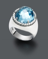 Get ready for an evening of cocktails and conversation. This stylish statement ring adds a subtle splash of color with an oval-cut blue topaz (11-8/10 ct. t.w.) set in polished sterling silver with an intricate rope edging. Size 7. Get ready for an evening of cocktails and conversation. This stylish statement ring adds a subtle splash of color with an oval-cut blue topaz (11-8/10 ct. t.w.) set in polished sterling silver with an intricate rope edging. Size 7.