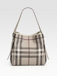 Signature check canvas pairs with rich leather in this slouchy essential.Double top handles, 8½ dropTop snap closureProtective metal feetDetachable zip pouchCanvas lining11W X 10½H X 3¾DImported Signature check canvas pairs with rich leather in this slouchy essential.Double top handles, 8½ dropTop snap closureProtective metal feetDetachable zip pouchCanvas lining11W X 10½H X 3¾DImported