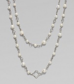 From the Quatrefoil Collection. A graceful sterling silver chain, stationed with lustrous freshwater pearls and quatrefoil-shaped open links, is fabulous as a single but long enough to double. Cultured freshwater pearls Sterling silver Length, about 48 Toggle closure Imported