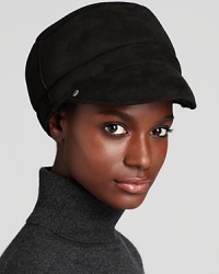 The warmth of shearling meets an updated silhouette in this UGG® Australia cap with front brim. The warmth of shearling meets an updated silhouette in this UGG® Australia cap with front brim.