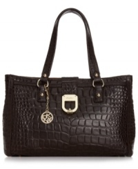 Every urban-jungle ensemble deserves exotic appeal, like this croc-embossed shopper from DKNY. Sumptuous leather is accented with gleaming signature hardware, while the spacious interior flaunts multiple pockets for effortless on-the-go style. Every urban-jungle ensemble deserves exotic appeal, like this croc-embossed shopper from DKNY. Sumptuous leather is accented with gleaming signature hardware, while the spacious interior flaunts multiple pockets for effortless on-the-go style.
