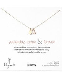 Symbolizing the love of a lifetime, Dogeared's delicate necklace shines with a trio of miniature hearts in silver, gold, and rose gold. Symbolizing the love of a lifetime, Dogeared's delicate necklace shines with a trio of miniature hearts in silver, gold, and rose gold.