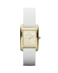 A crisp shade meets clean lines on this Michael Kors watch, which works an effortless elegance with its gold plated case, stark dial, and modern white leather strap. A crisp shade meets clean lines on this Michael Kors watch, which works an effortless elegance with its gold plated case, stark dial, and modern white leather strap.
